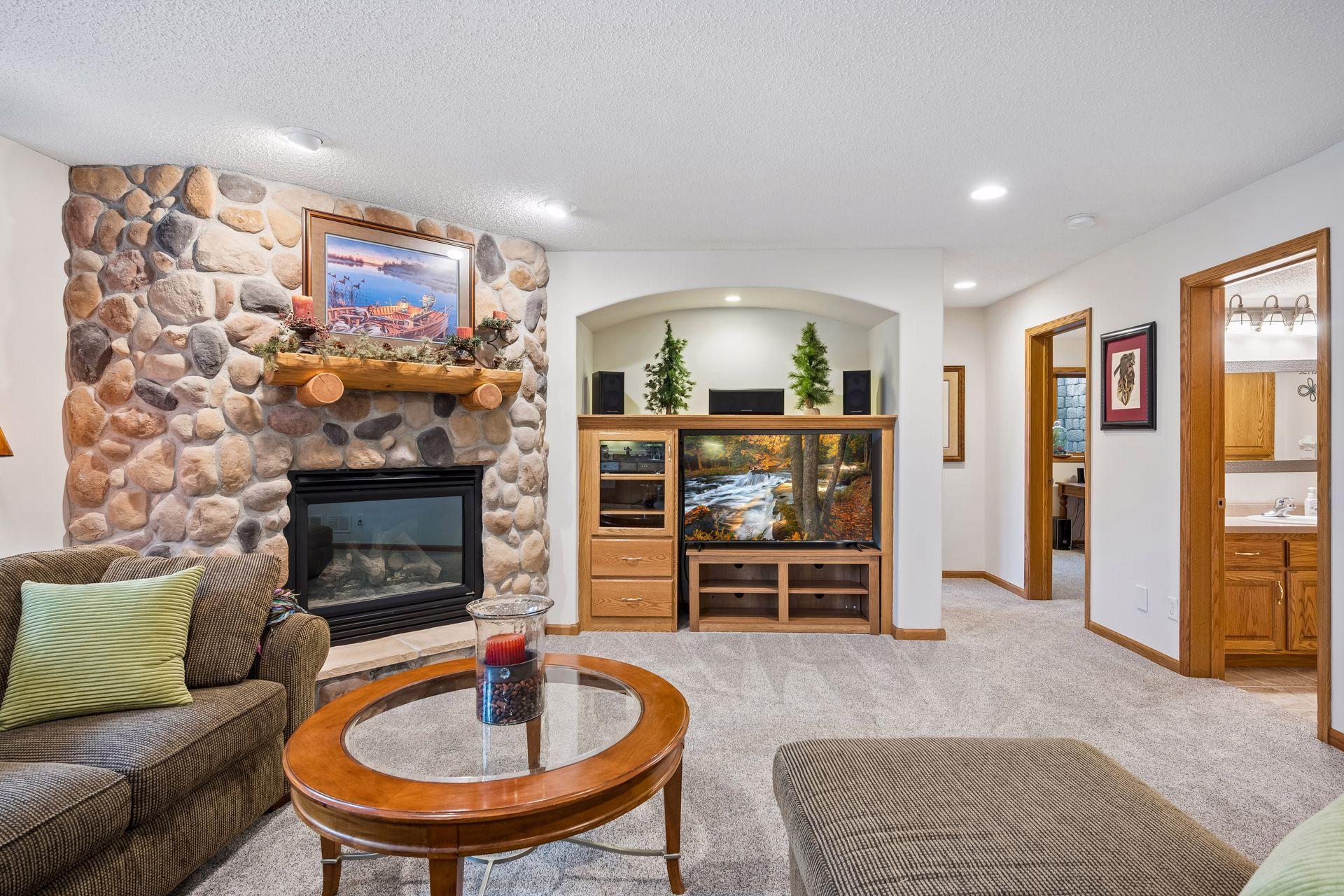 Floor to ceiling stone fireplace