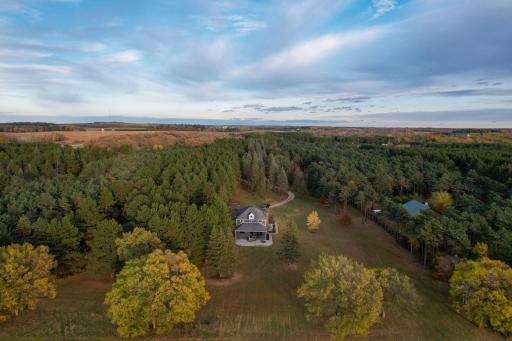 Peaceful 5-acre setting surrounded by mature pines, offering privacy and a true Northwoods feel just minutes from Perham
