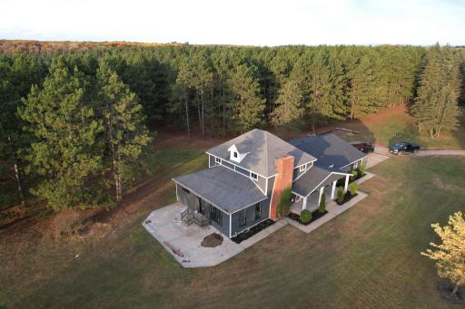 Peaceful 5-acre setting surrounded by mature pines, offering privacy and a true Northwoods feel just minutes from Perham.