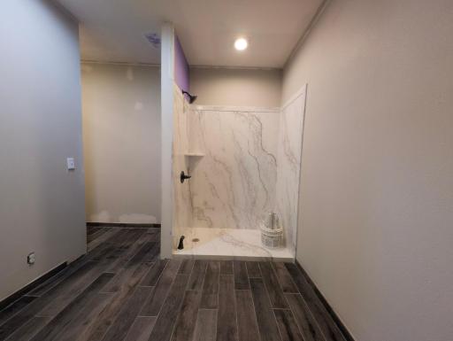 Newly updated primary bathroom offering a fresh, modern feel and added comfort to your private suite.