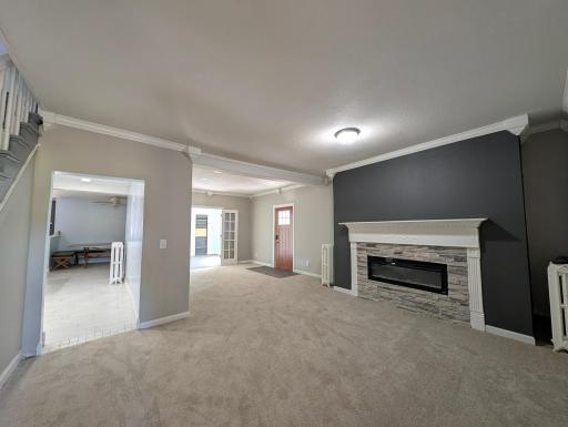 Cozy fireplace creates a warm focal point, perfect for relaxing nights and gathering with family and friends.