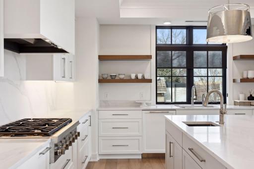 Natural light floods into the bright kitchen
