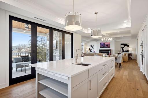 Custom cabinets throughout the kitchen provide for additional storage space