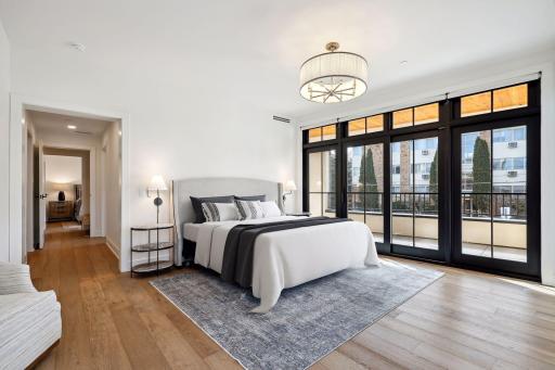 Spacious primary bedroom with access to the 44' balcony