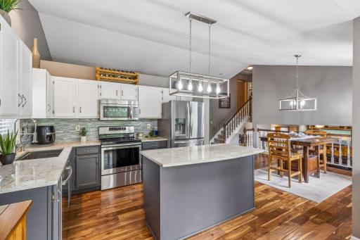 The heart of the home! Bright kitchen and dining area filled with natural light and perfect for entertaining.