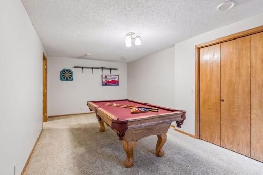 Spacious bedroom or recreation room in the basement large enough for regulation-size pool table.