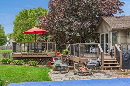 Cozy fire pit area on the deck, ideal for evening gatherings with family and friends.