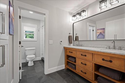 [family suite bath] heated tile floors.jpg