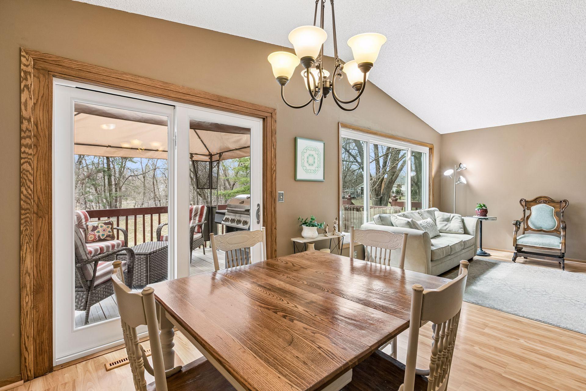 Incredible views inside & out! The informal dining area looks out to the deck & canopy that provide endless summer evenings enjoying the tranquility of natures offerings.