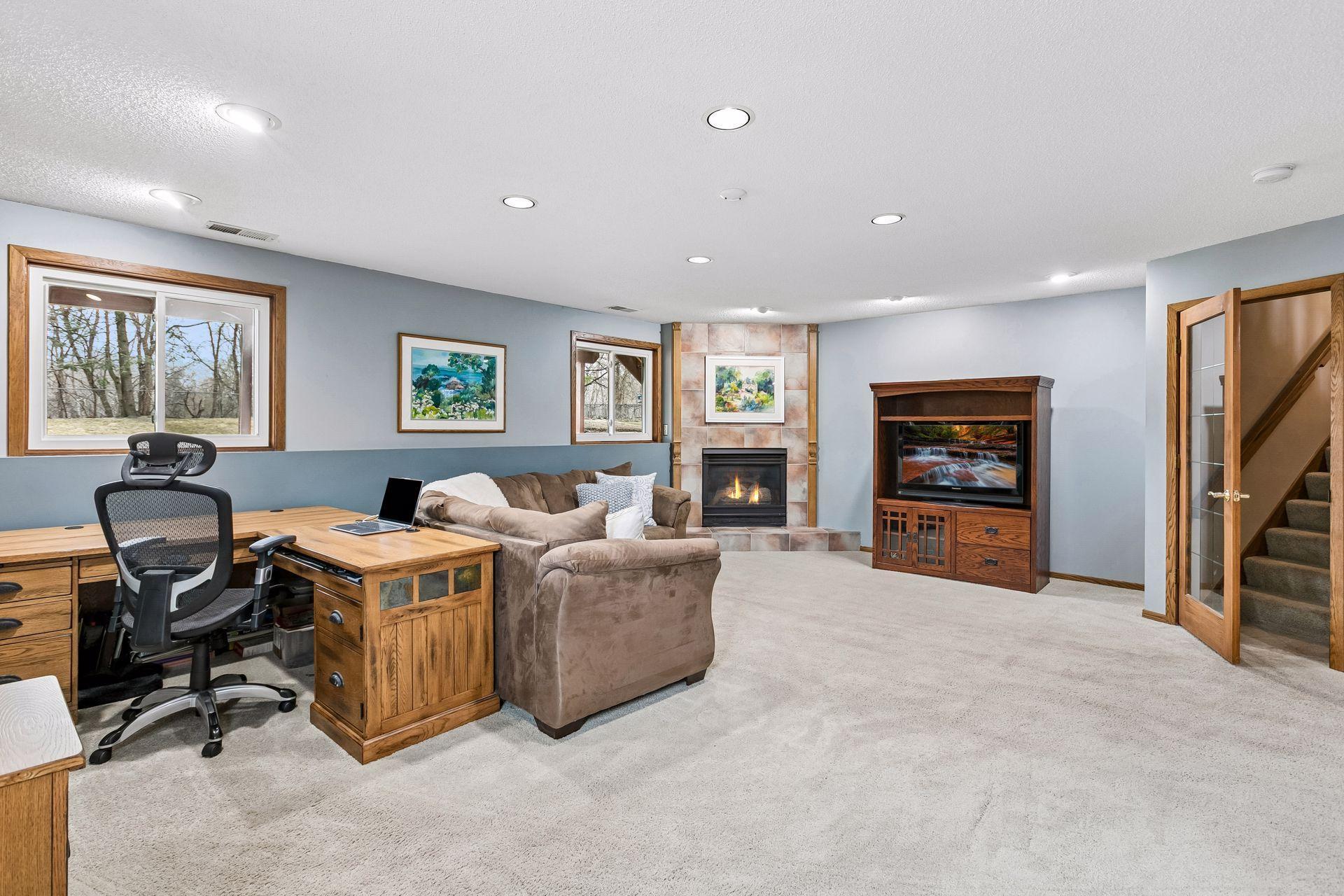 Large lower level family room provides great space for kids while offering flex space as well.