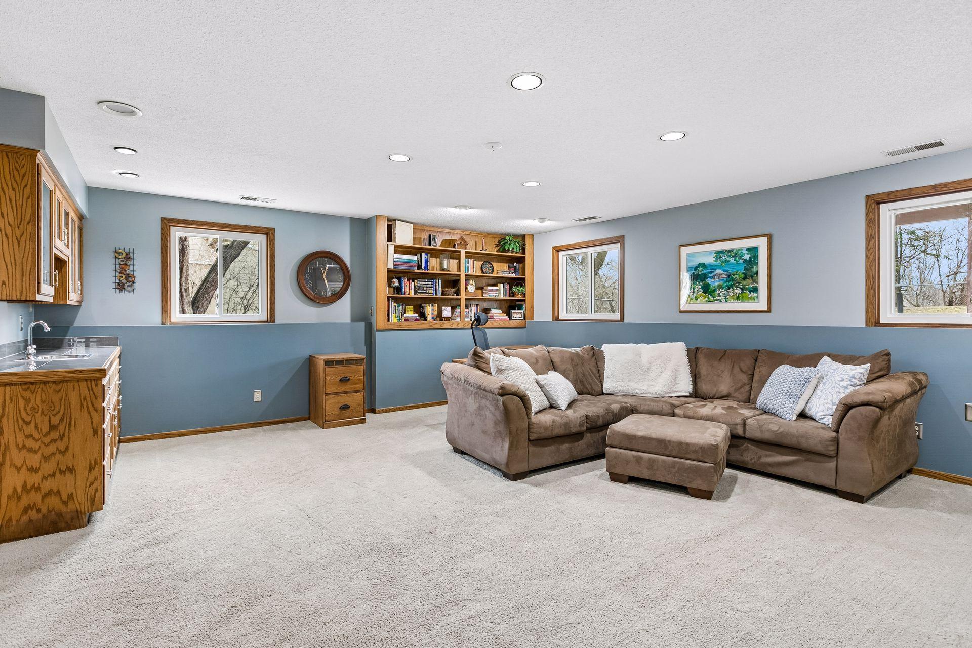The lower level family room with wet bar and fireplace is a favorite place to hang out!