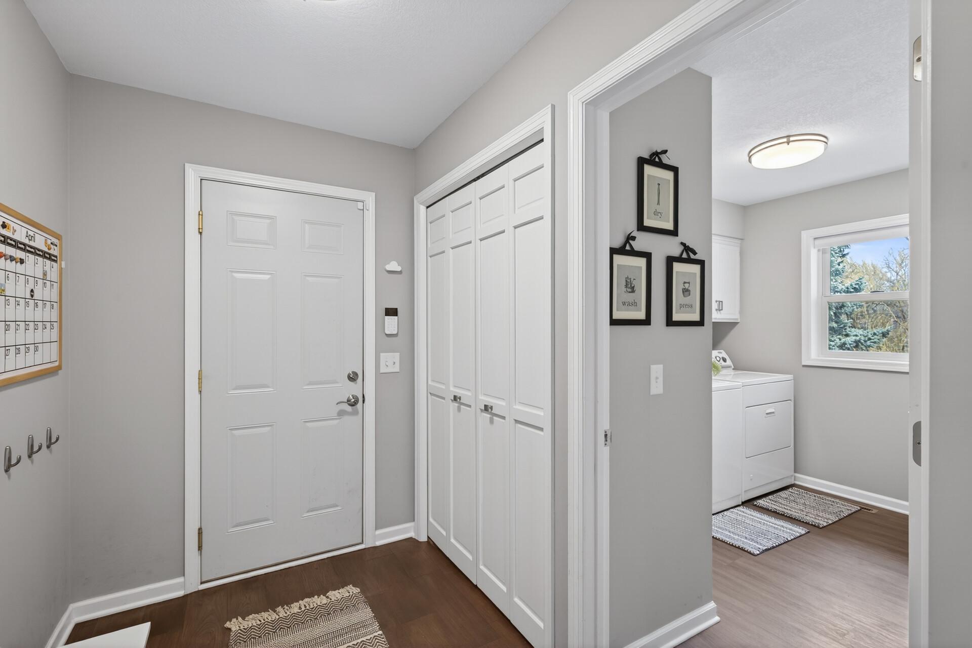 Mud room on the main level leading to the laundry room and two-stall garage.