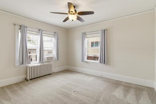 Second bedroom ideal for guests, office, or flex space