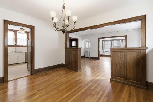 Classic dining space featuring beautiful millwork and built-in storage
