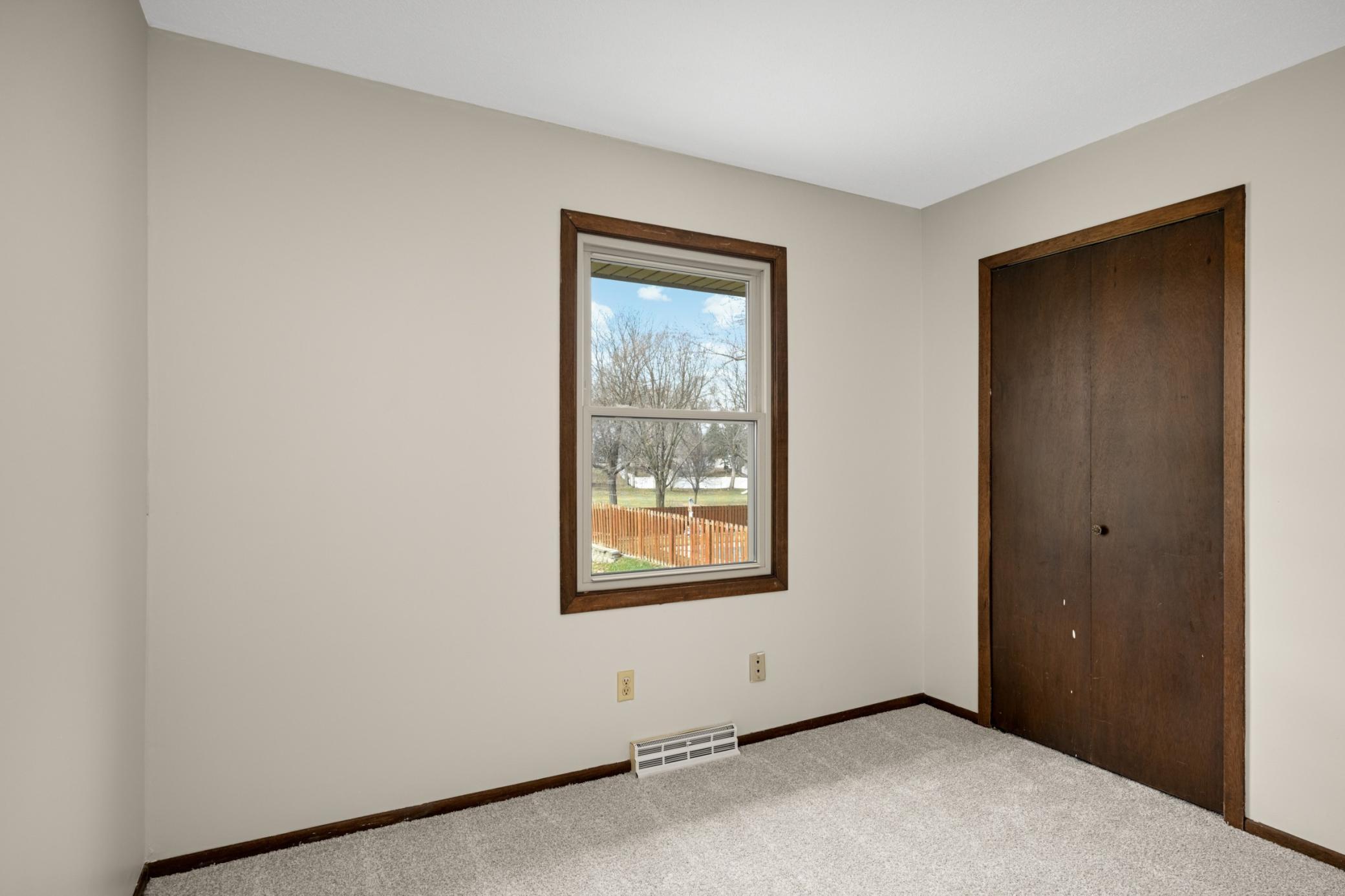 Main Floor Bedroom with new carpet and paint