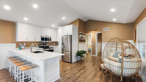 Open concept, beautifully renovated to the bare bones, including new stainless-steel appliances, stone counter tops.