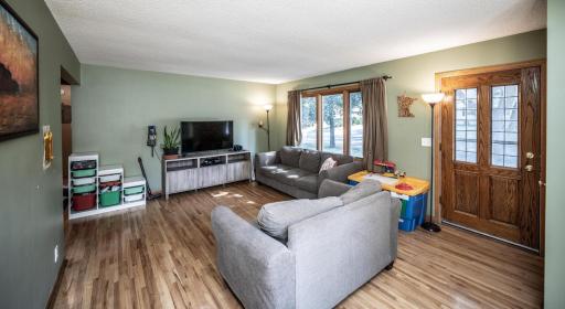 The large windows let in lots of natural light