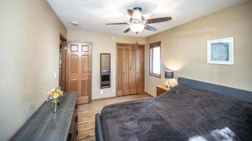 Primary bedroom with ceiling fan