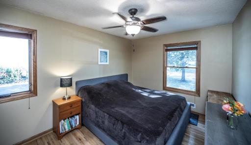 Primary bedroom with ceiling fan