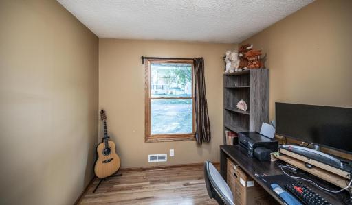 Third bedroom on the main level, currently being used as an office