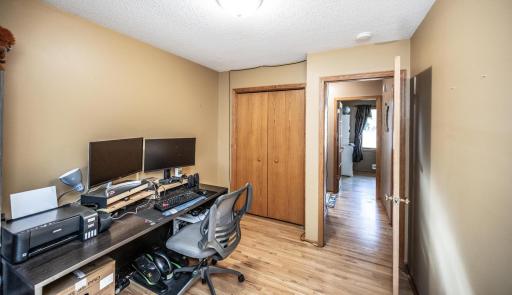 Third bedroom on the main level, currently being used as an office
