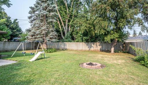Enjoy the fire pit in the backyard