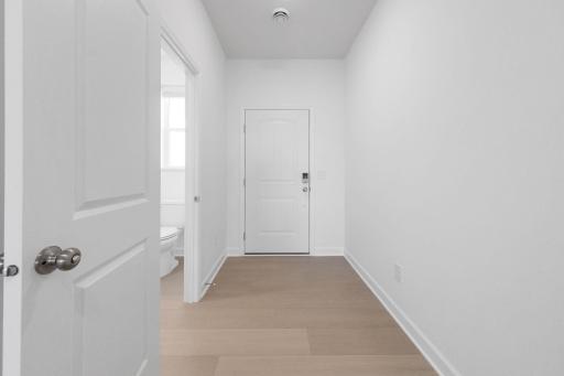 (Photo of a very similar home, actual finishes may vary)