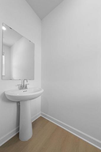 (Photo of a very similar home, actual finishes may vary)