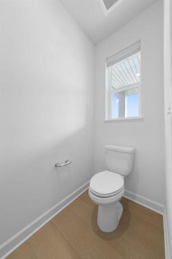 (Photo of a very similar home, actual finishes may vary)