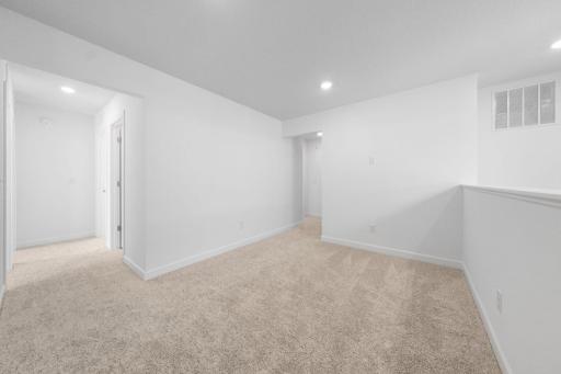 (Photo of a very similar home, actual finishes may vary)
