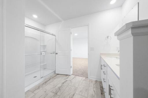 (Photo of a very similar home, actual finishes may vary)