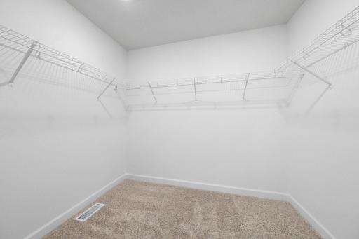 (Photo of a very similar home, actual finishes may vary)