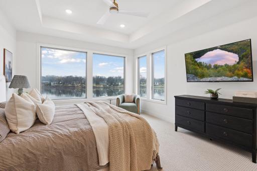Primary bedroom - Large windows overlooking the Mississippi River
