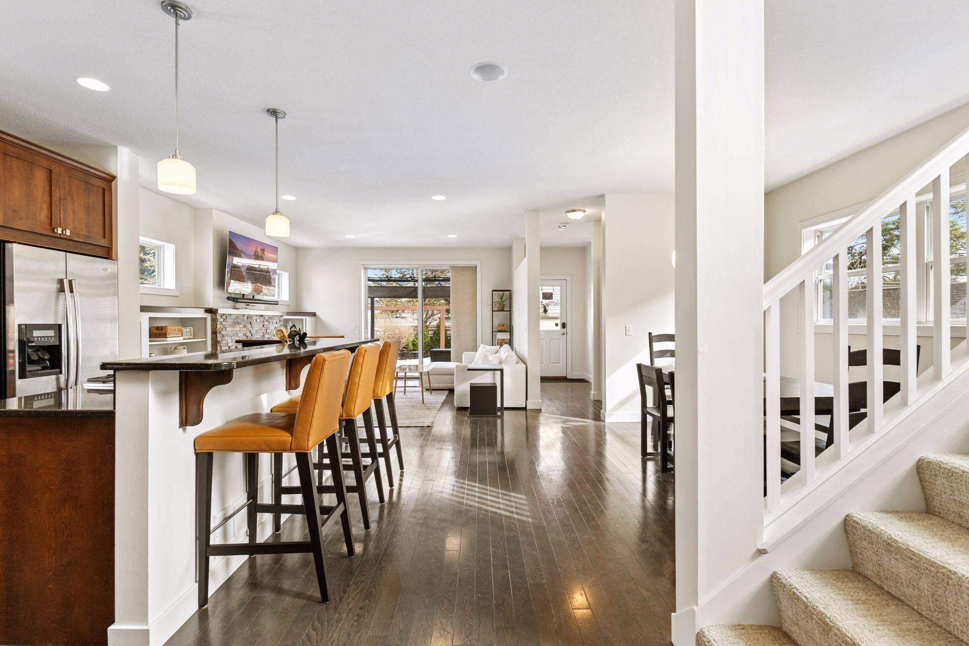 Beautiful, SUN-FILLED main level living and dining