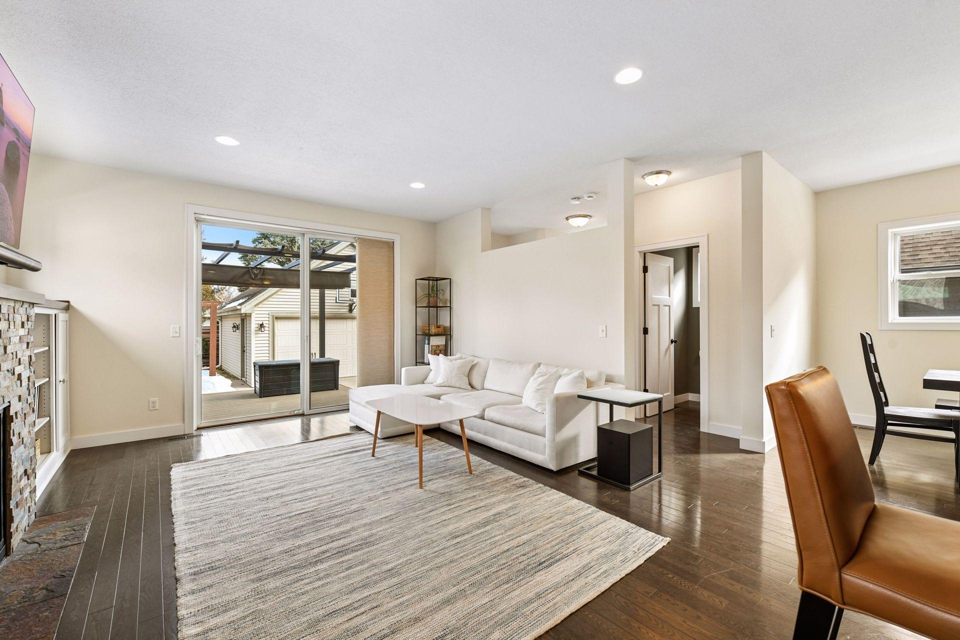 East facing sliding door out to a Trex deck. Wonderful for entertaining!