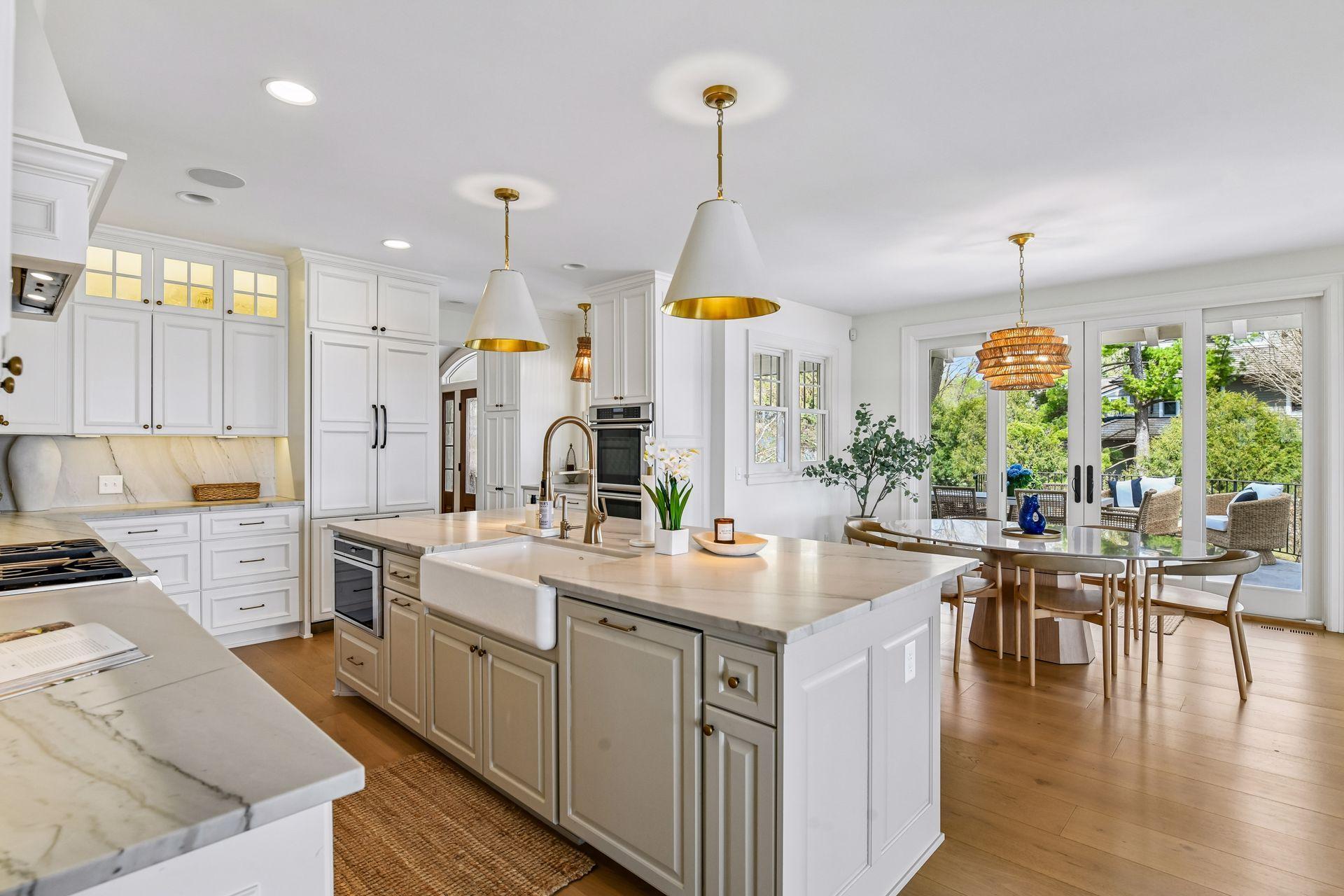 Kitchen and dining area open up onto large patio