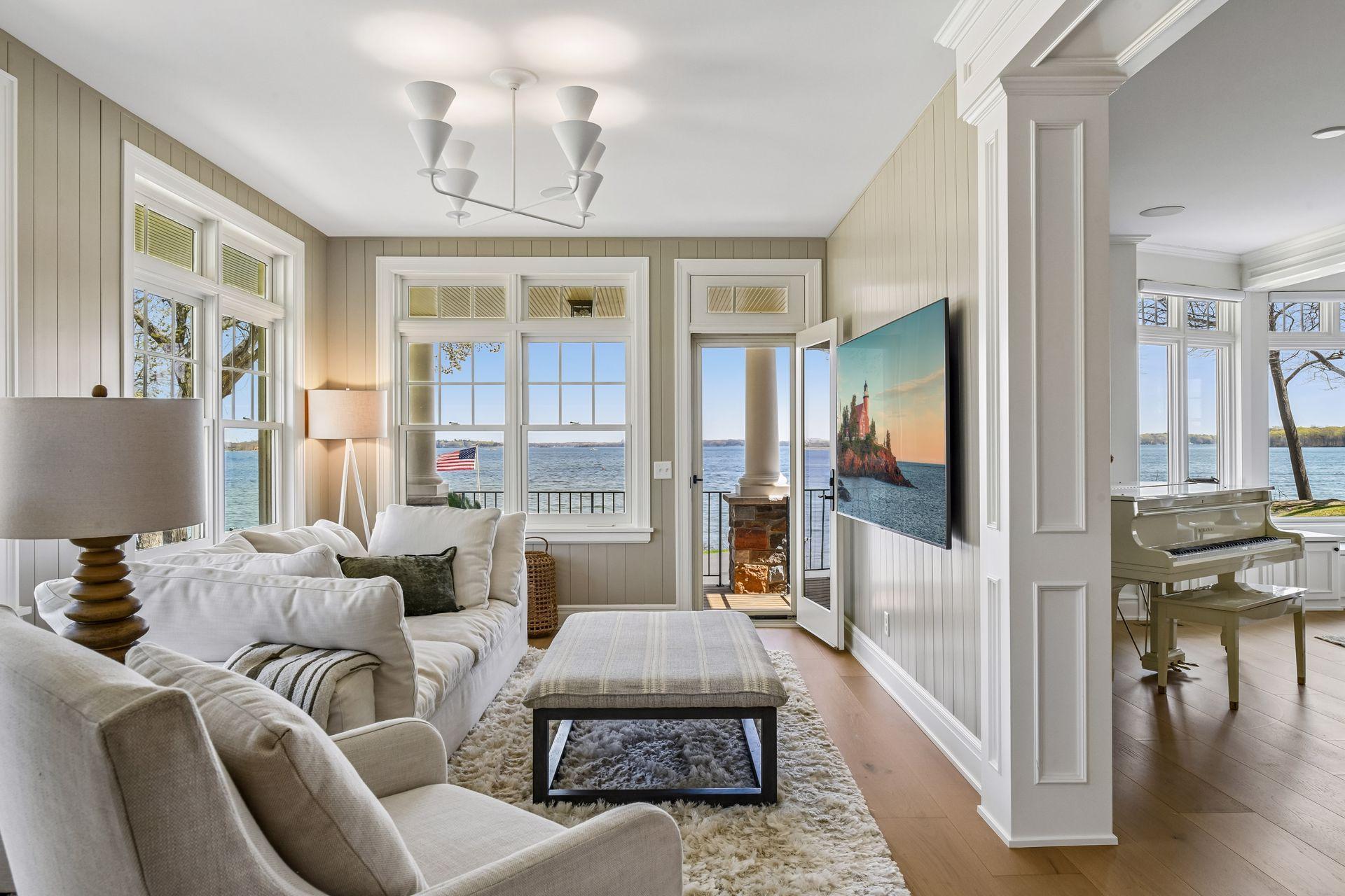 Den is has new wood paneling for a cozy atmosphere