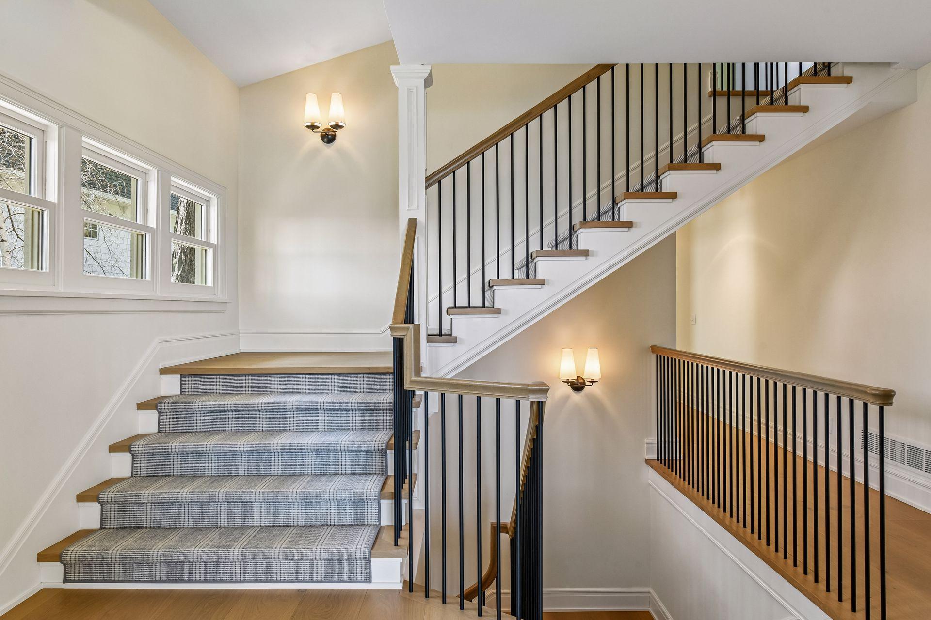 New floors, stairs, treds, railings on all three levels. New wood carpet on stairs.