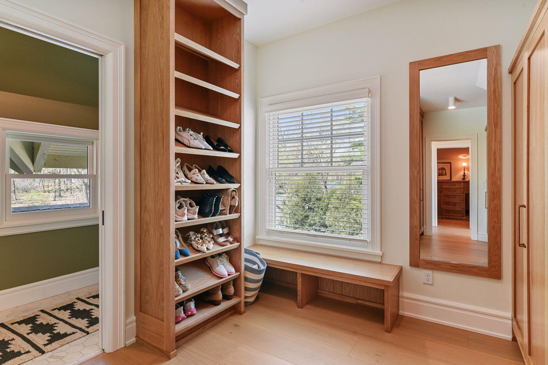 Brand new double primary closets with solid white oak built-ins