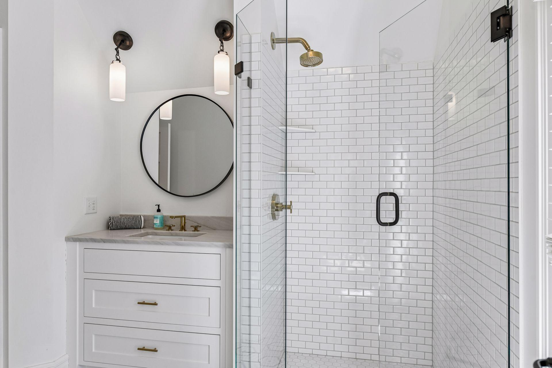 Bathroom attached to bedroom 3 with acess to hallway. Floor newly tiled