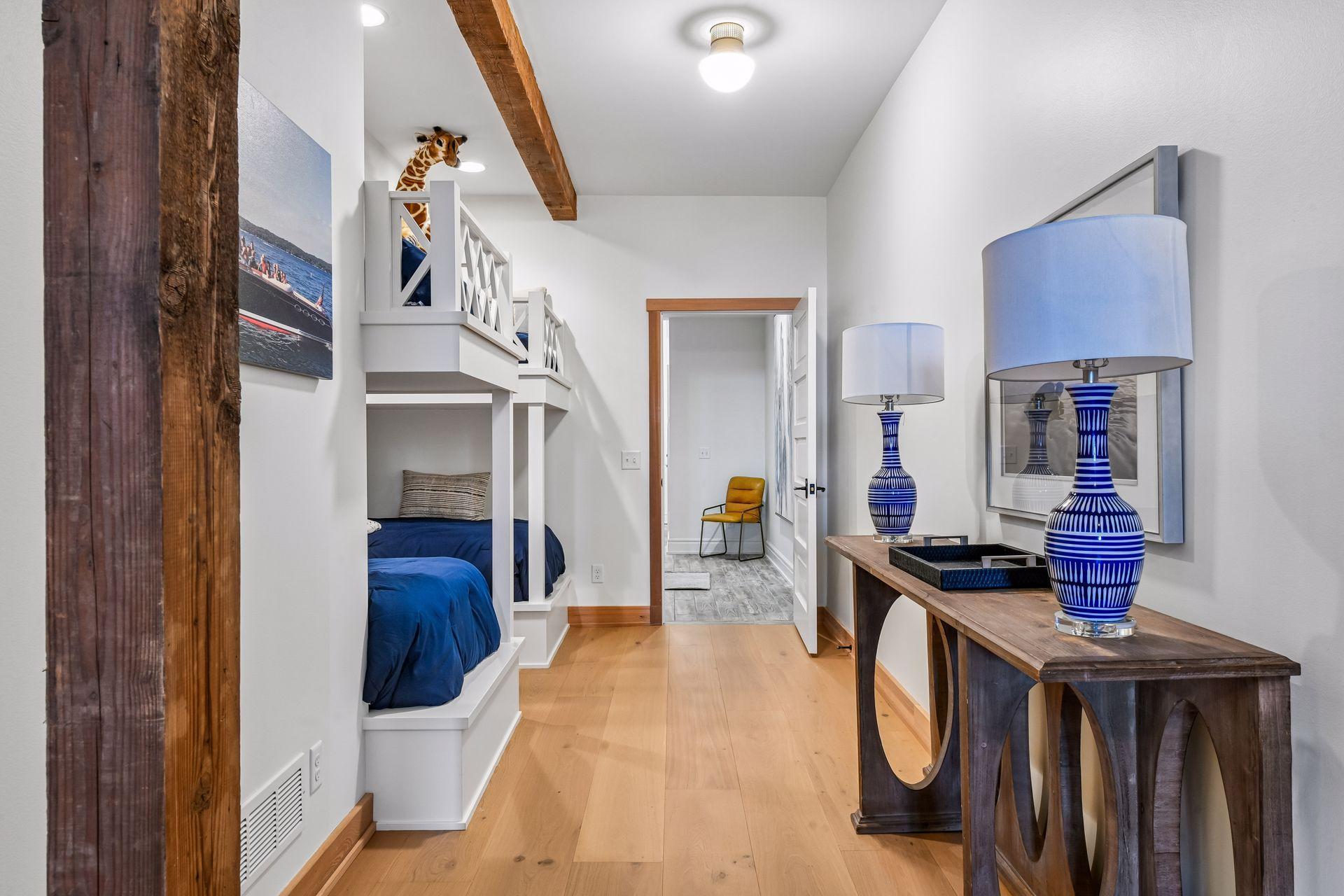 New built in bunk beds with a new door for privacy from the mudroom.