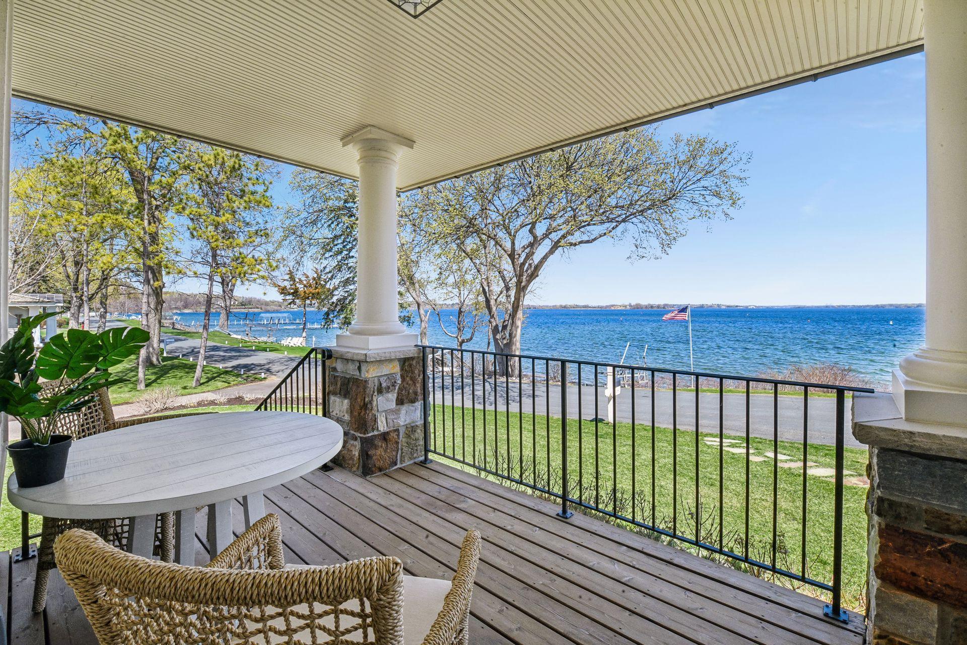 Porch, outside of den, perfect for a morning coffee or evening cocktail