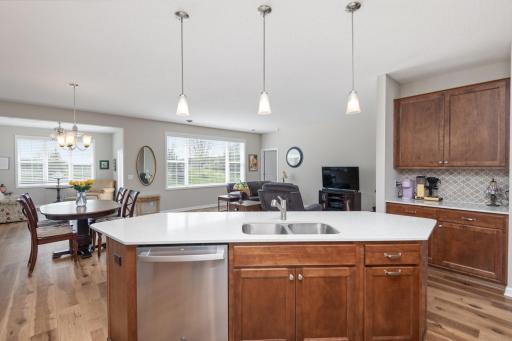 Stunning Kitchen with center island, quartz countertops & stainless appliances