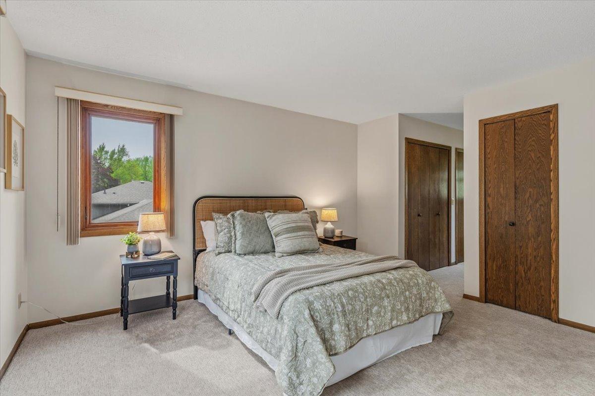 Spacious primary bedroom with 3 closets