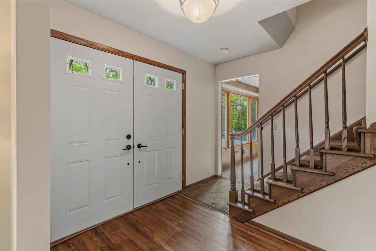Hardwood floors greet you at the front door entrance