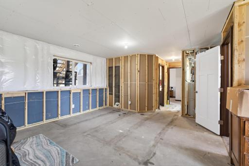 Unfinished area of basement for additional entertaining or another bedroom