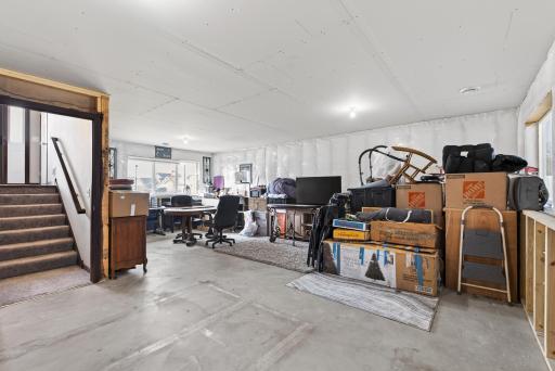 Unfinished area of basement for additional entertaining or another bedroom