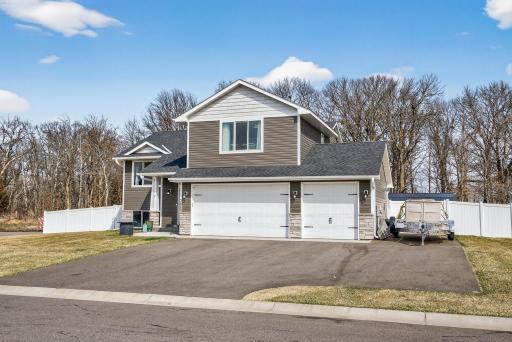 Front of House. Extra driveway space on side of garage