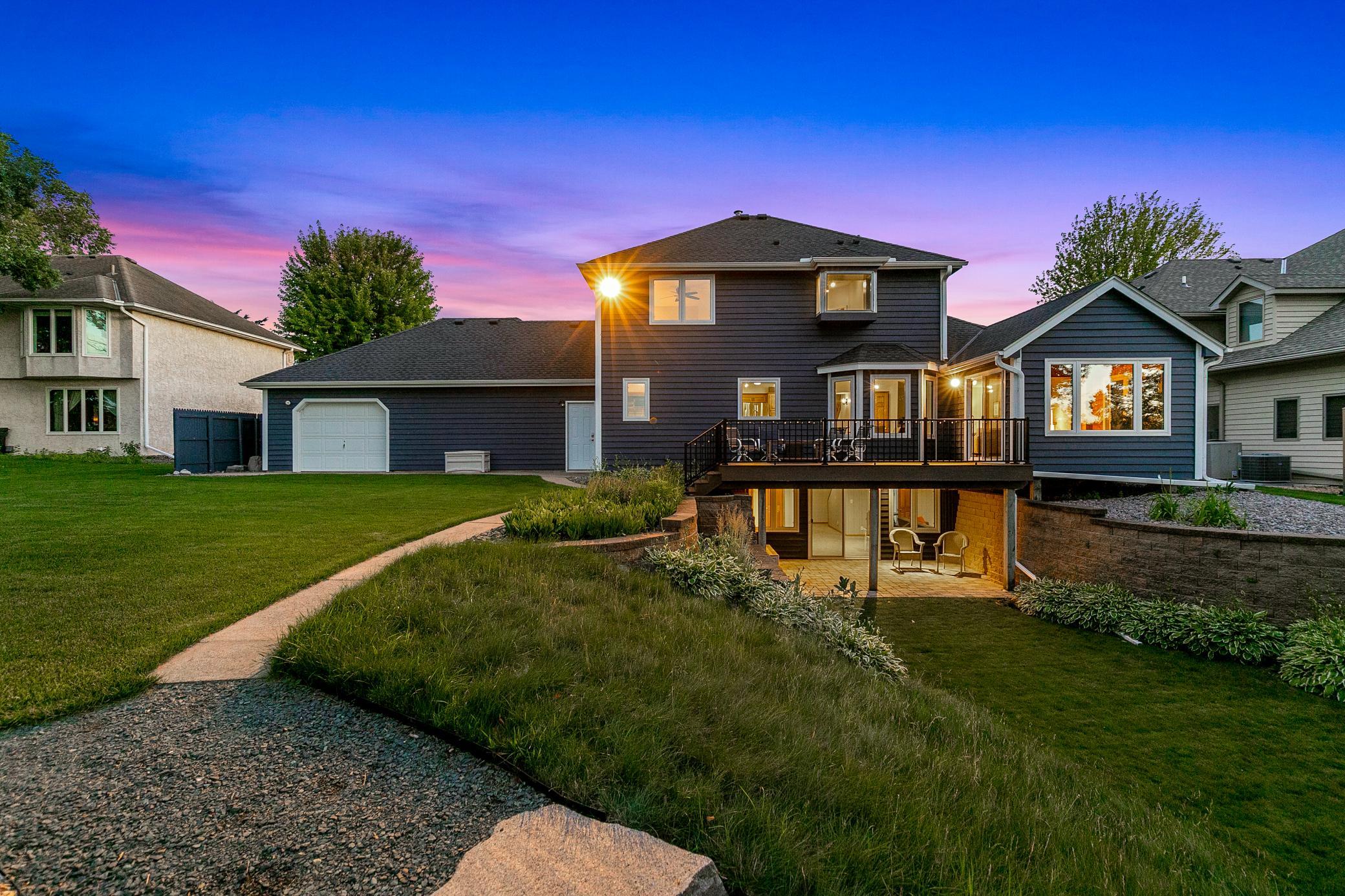 All three floors of this walkout two-story offer views of the Mississippi River.