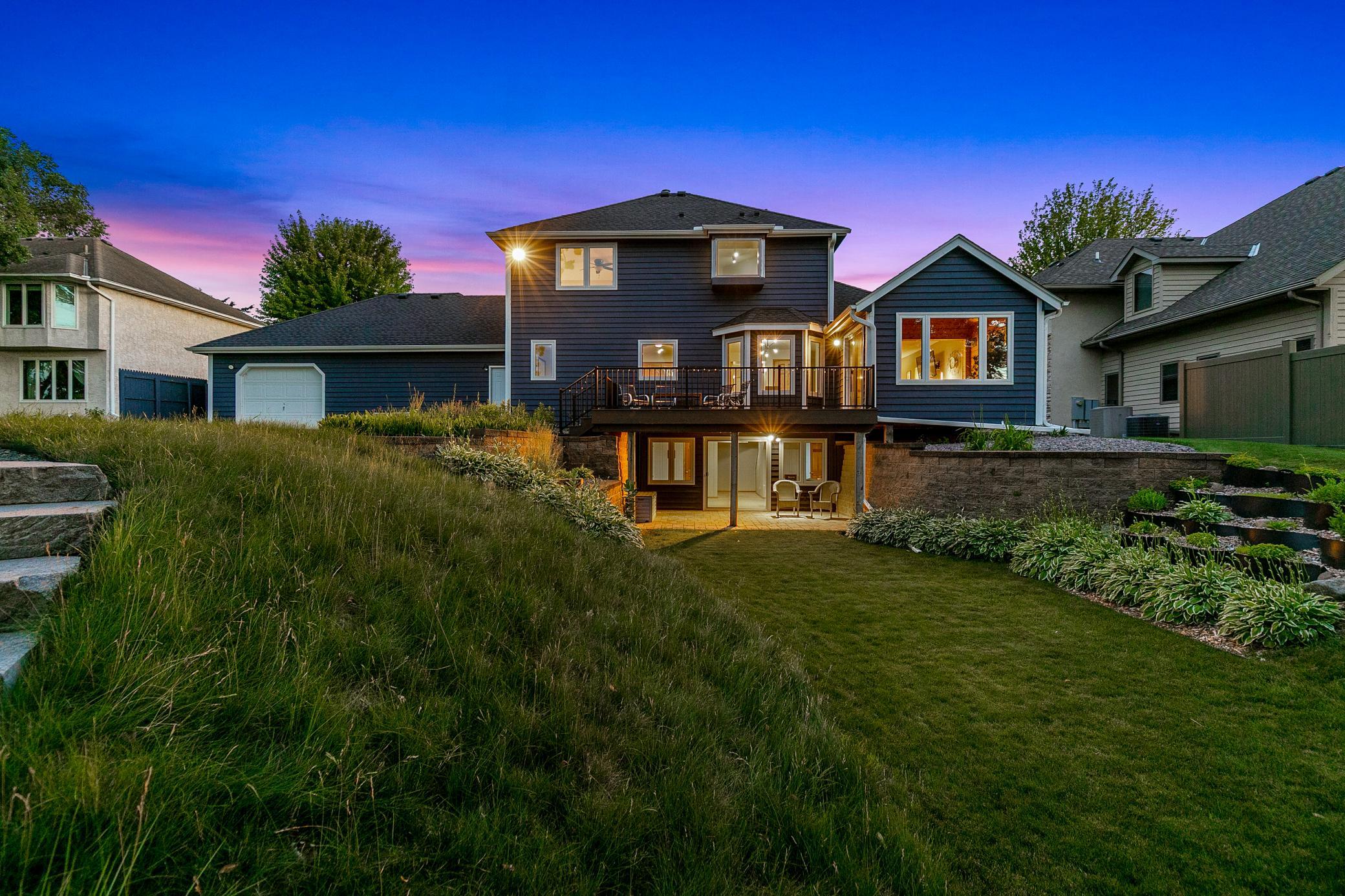 A covered paver patio is located just through the sliding glass door which is great for watching storms roll in over the river bluff.